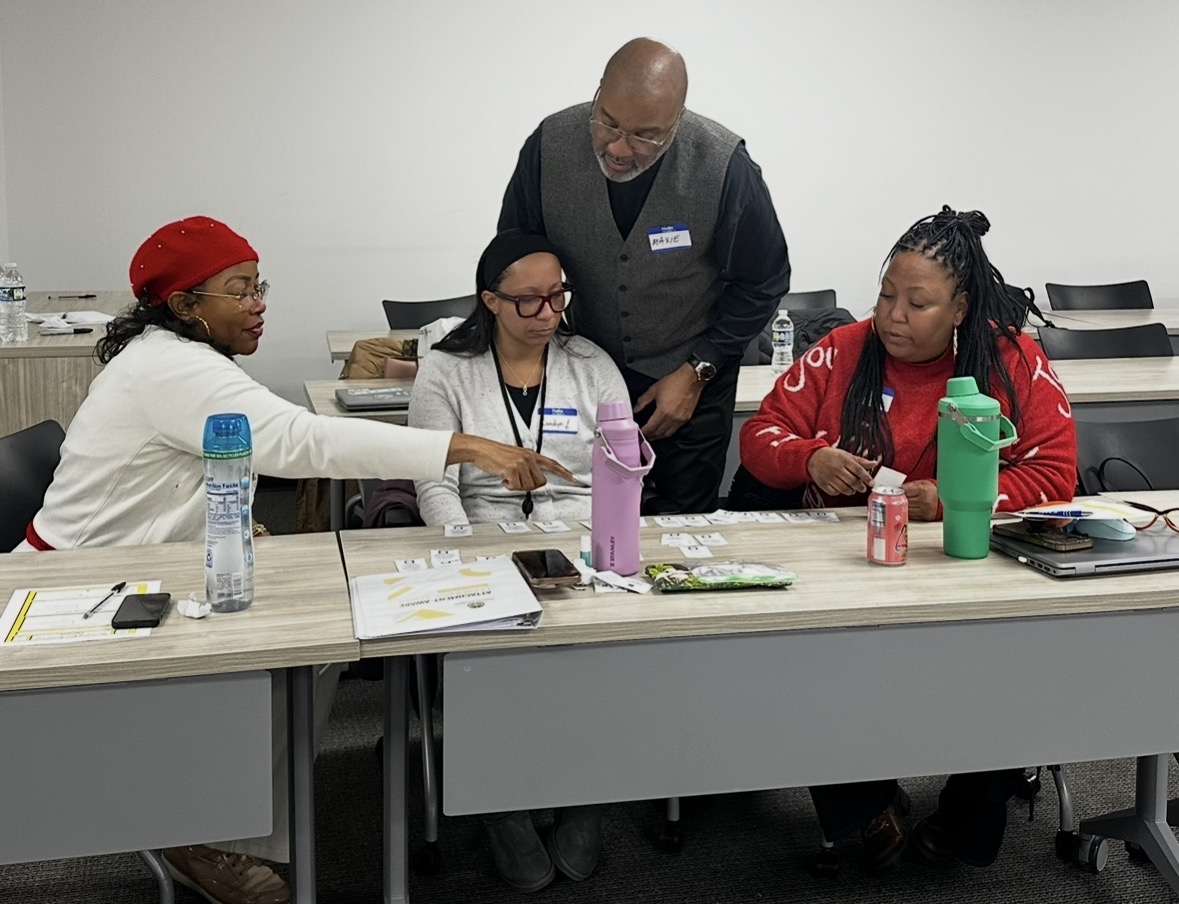 Participants working together during a leadership workshop